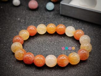 (พราว) หินเกล็ดมังกรส้ม Orange Crackle Agate (ขนาด 10 มม.) ผ่านพิธีปลุกเสกและบรรจุพุทธคุณเรียบร้อยแล้ว