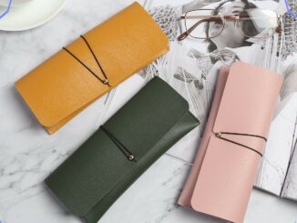 Melodygoods1 กระเป๋าใส่แว่นตา หัวเข็มขัดพับได้ แบบพกพา สีพื้น กระเป๋าเก็บแว่นตา