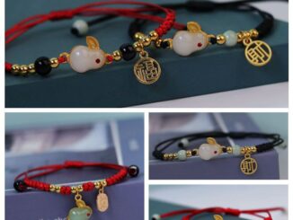 สร้อยข้อมือ เชือกถัก รูปกระต่าย สีแดง และสีดํา สามารถปรับได้ สําหรับผู้ชาย และผู้หญิง