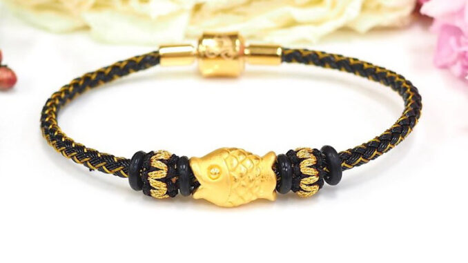 Charm ปลาทอง น้ำหนัก 0.55-0.6 กรัม ทองคำแท้ 99.9%