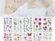สติกเกอร์รอยสักชั่วคราว ลายดอกเดซี่ ขนาดเล็ก กันน้ํา ติดทนนาน สีสันสดใส