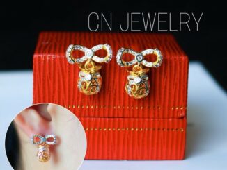 ต่างหูโบว์ถุงทองเพชร  รุ่นAA51  1คู่ CN Jewelry earing ตุ้มหู ต่างหูแฟชั่น ต่างหูเกาหลี ต่างหูน่ารัก