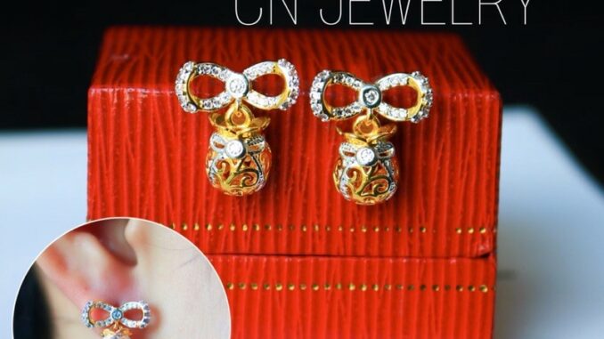 ต่างหูโบว์ถุงทองเพชร  รุ่นAA51  1คู่ CN Jewelry earing ตุ้มหู ต่างหูแฟชั่น ต่างหูเกาหลี ต่างหูน่ารัก