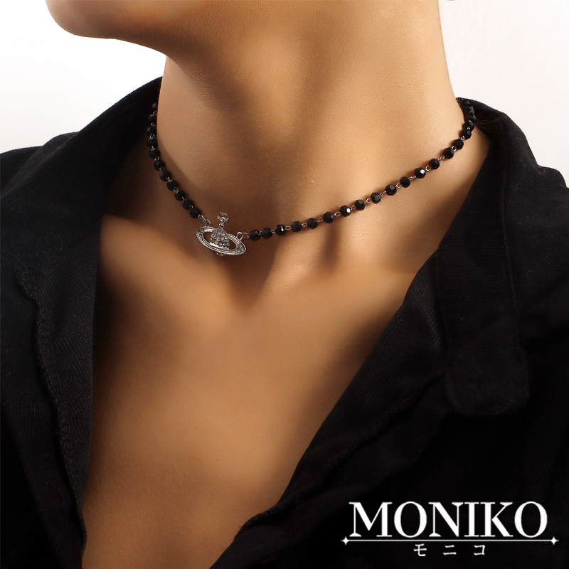 MONIKO สร้อยคอ ประดับลูกปัด ลายดาวเสาร์ สีดํา แฟชั่นสําหรับชาย และหญิง
