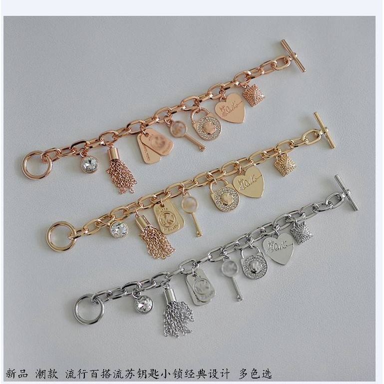 Mk สร้อยข้อมือเหล็กไทเทเนียม จี้รูปหัวใจ ประดับเพชร
