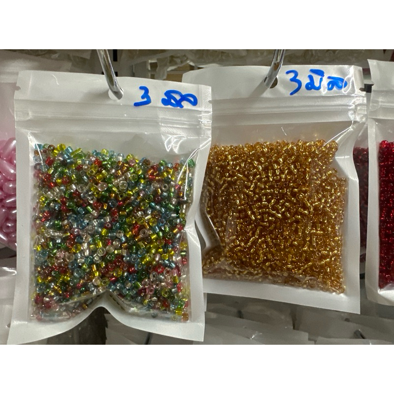 ลูกปัดเม็ดทรายยี่ห้อKสอดใส้ขนาด3มิลถุง70กรัม
