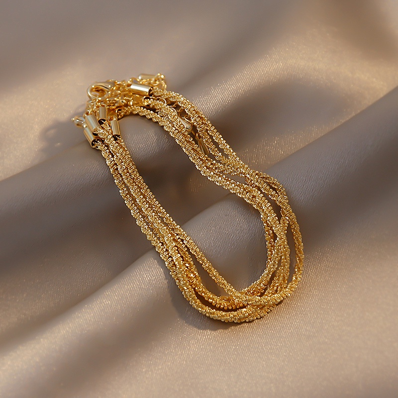 สร้อยข้อมือโซ่ทอง 18k ของผู้หญิงผู้ชายกำไลข้อมือสแตนเลสมินิมอล ไม่ลอกดำใส่อาบน้ำได้