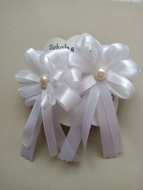 โบว์นักเรียนสีขาว  คู่ละ 30  บาท