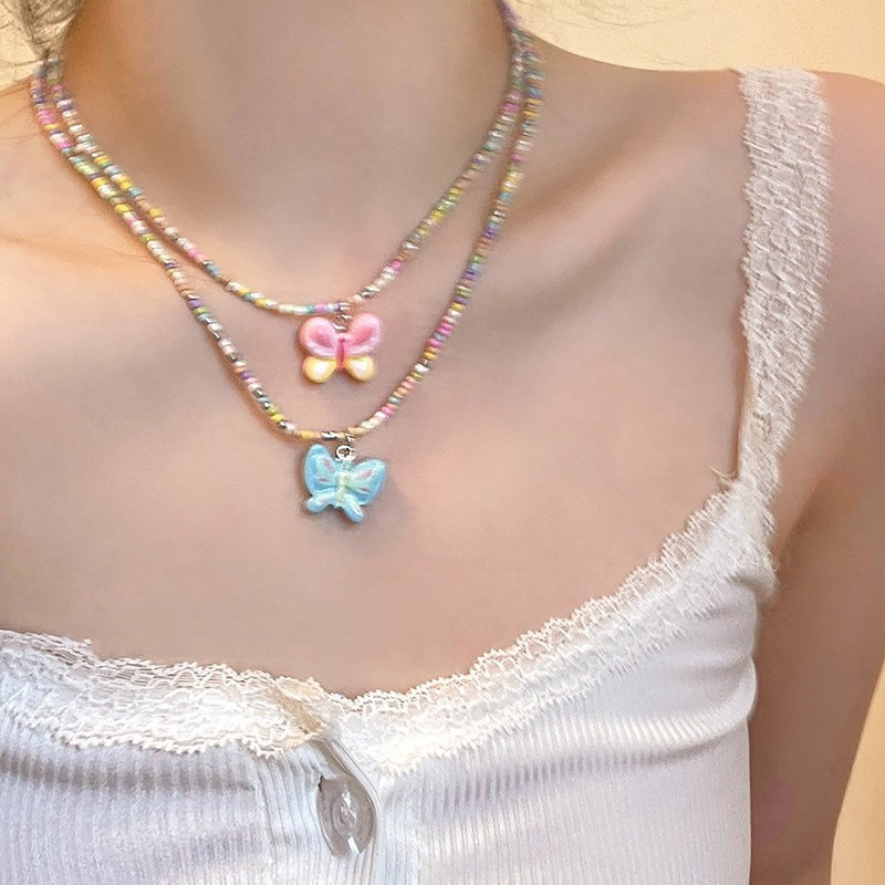 【เงินสดในการจัดส่ง】สร้อยคอลูกปัดหัวใจสีสันสดใส สร้อยคอลูกปัด ลายผีเสื้อ มิลเลนเนียม Y2k