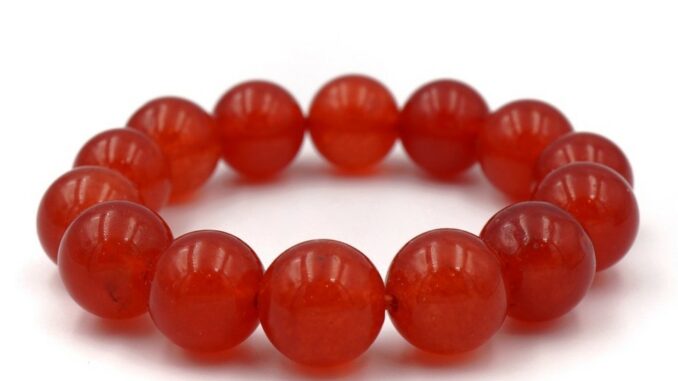 LUCKYSTONE หินสีนำโชค สร้อยข้อมือหินแท้ โทนสีแดงสด ขนาด 12 มม. by siamonlineshop