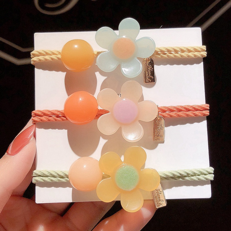 ยางรัดผมแฟชั่น ยางรัดผมแฟชั่นเกาหลี ติดจี้ดอกไม้ หมีน้อย แฟชั่นมีหลายสี
