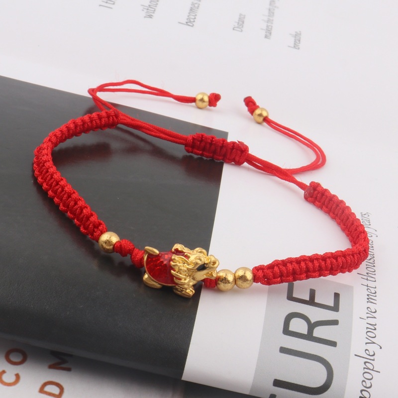 สร้อยข้อมือ เชือกถัก รูปกระต่าย สีแดง และสีดํา สามารถปรับได้ สําหรับผู้ชาย และผู้หญิง