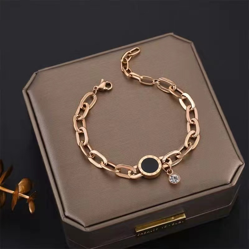 Ht สร้อยข้อมือ เหล็กไทเทเนียม ชุบทอง 18K ประดับเพชร ทรงกลม สีดํา สไตล์โรมัน