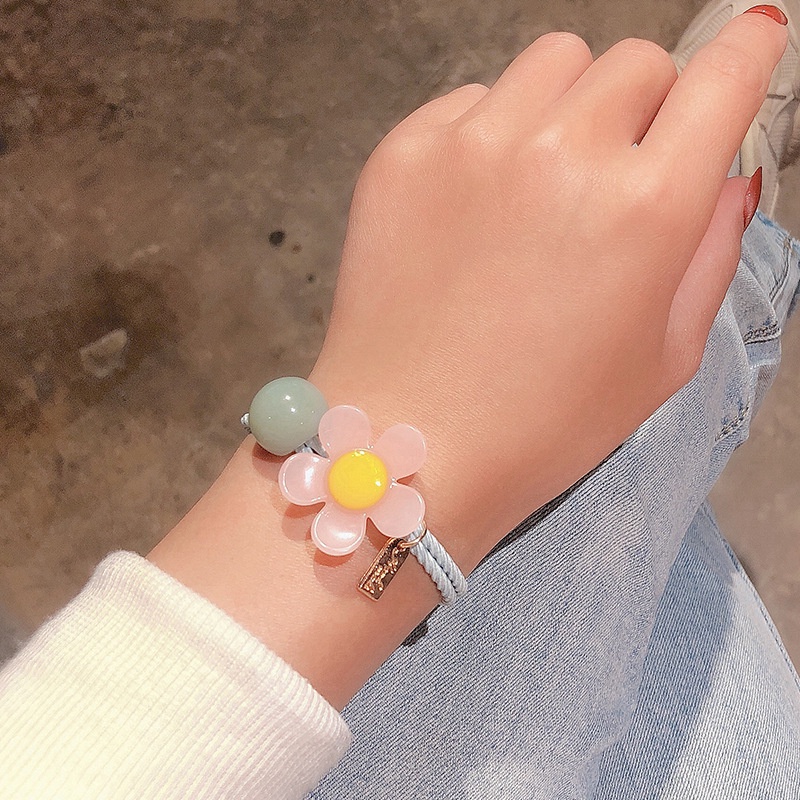 ยางรัดผมแฟชั่น ยางรัดผมแฟชั่นเกาหลี ติดจี้ดอกไม้ หมีน้อย แฟชั่นมีหลายสี