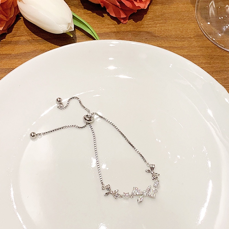 ในไทย-ระดับรายการ Lux Zircon Bow สร้อยข้อมือสำหรับสุภาพสตรีอุปกรณ์เสริมที่ละเอียดอ่อนCOD
